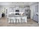 Modern kitchen with an island, granite countertops, stainless steel appliances, and ample cabinet space at 1619 Honey Trl, Monroe, NC 28112