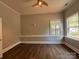 Neutral bedroom featuring hardwood floors and a ceiling fan at 179 Tomahawk Ln, Mount Gilead, NC 27371