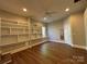 Spacious bedroom with wood floors and built in shelving at 179 Tomahawk Ln, Mount Gilead, NC 27371