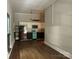 Spacious kitchen with stainless steel appliances and unique color accents at 179 Tomahawk Ln, Mount Gilead, NC 27371