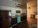 Kitchen boasts vintage appliances and hardware at 179 Tomahawk Ln, Mount Gilead, NC 27371