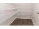 Walk-in closet with a series of white, wire-frame shelving for optimal storage solutions at 184 Swann Rd # 1, Statesville, NC 28625