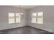 Bright dining room with large windows and decorative molding at 184 Swann Rd # 1, Statesville, NC 28625