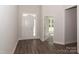 Inviting foyer with hardwood floors, a white front door, and ample natural light at 184 Swann Rd # 1, Statesville, NC 28625