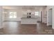 Modern kitchen featuring white cabinets, granite countertops, and stainless steel appliances at 184 Swann Rd # 1, Statesville, NC 28625