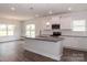 Stylish kitchen with white cabinets, an island, and stainless steel appliances at 184 Swann Rd # 1, Statesville, NC 28625