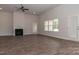 Spacious living room featuring hardwood floors, a fireplace, and large windows at 184 Swann Rd # 1, Statesville, NC 28625