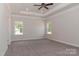 This spacious main bedroom offers a ceiling fan and windows with a view at 184 Swann Rd # 1, Statesville, NC 28625