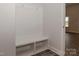 Convenient mudroom area with a built-in bench, storage cubbies, and coat hooks for organization at 184 Swann Rd # 1, Statesville, NC 28625