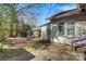 Backyard featuring the home's exterior with siding, patio, and landscaping at 21 W D St, Newton, NC 28658