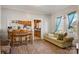Bright dining room with hardwood floors and natural light perfect for entertaining at 21 W D St, Newton, NC 28658