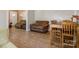 Open layout featuring dining area and an adjoining living room with hardwood floors at 21 W D St, Newton, NC 28658