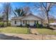 Charming single-story home with a covered front porch, offering curb appeal and outdoor enjoyment at 21 W D St, Newton, NC 28658