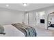 Open bedroom concept featuring a connecting door to a modern bathroom and decor at 2108 Sabra St, Gastonia, NC 28054