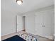 Well lit bedroom featuring neutral color carpet and accents at 2108 Sabra St, Gastonia, NC 28054