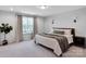 Bright bedroom featuring a large window, recessed lighting, and stylish decor at 2108 Sabra St, Gastonia, NC 28054