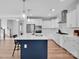 Spacious kitchen with a large island, stainless steel appliances, and white cabinets at 2108 Sabra St, Gastonia, NC 28054