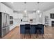 Gourmet kitchen featuring stainless steel appliances, white cabinetry, and marble countertops at 2108 Sabra St, Gastonia, NC 28054