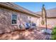Inviting back patio with stylish furniture, offering a great space for outdoor lounging at 227 Donsdale Dr, Statesville, NC 28625
