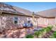Relaxing back patio with comfortable seating, perfect for enjoying the outdoors at 227 Donsdale Dr, Statesville, NC 28625