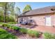 Cozy back patio with an umbrella and a seating area for relaxing or entertaining guests at 227 Donsdale Dr, Statesville, NC 28625