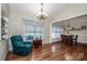 Inviting dining room with hardwood floors, ample natural light, and a view into the dining area at 227 Donsdale Dr, Statesville, NC 28625