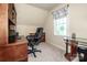 Bright and functional home office with a large window, desk, and storage space for efficient work at 227 Donsdale Dr, Statesville, NC 28625