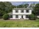 Charming two-story home with black shutters, well maintained landscaping and beautiful lawn at 2413 Bergen Ct, Charlotte, NC 28210