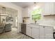 Charming kitchen with stainless steel appliances and an adjacent dining area at 2413 Bergen Ct, Charlotte, NC 28210