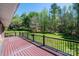 A spacious deck provides scenic views of the lush, tree-lined backyard, perfect for outdoor relaxation and entertaining at 2426 36Th Ne Ave, Hickory, NC 28601