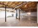 Unfinished basement featuring exposed ductwork and concrete flooring at 2426 36Th Ne Ave, Hickory, NC 28601