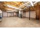 Unfinished basement with concrete flooring and exposed overhead utilities at 2426 36Th Ne Ave, Hickory, NC 28601