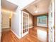 Inviting bedroom featuring wood floors, a vaulted ceiling, and a window with blue valance at 2426 36Th Ne Ave, Hickory, NC 28601
