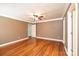 Spacious bedroom features hardwood floors and a decorative ceiling fan at 2426 36Th Ne Ave, Hickory, NC 28601
