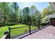 A view from the expansive deck offers a tranquil space for outdoor living and serene views of the lush backyard at 2426 36Th Ne Ave, Hickory, NC 28601