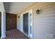 Inviting front door with decorative sidelights, enhancing the entrance to the home at 2426 36Th Ne Ave, Hickory, NC 28601