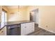 Bright kitchen features stainless steel appliances, gray countertops, breakfast bar, and dishwasher at 2426 36Th Ne Ave, Hickory, NC 28601