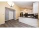 Open concept kitchen with stainless appliances, gray countertops, breakfast bar, and pendant lighting at 2426 36Th Ne Ave, Hickory, NC 28601