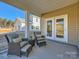 Cozy back porch with comfortable seating, perfect for relaxing outdoors at 2803 Morning Song Way, Lancaster, SC 29720