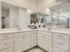Bright bathroom featuring double sinks, large mirrors, and contemporary fixtures at 2803 Morning Song Way, Lancaster, SC 29720