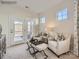 Cozy seating area with lots of light from windows and a patio door at 2803 Morning Song Way, Lancaster, SC 29720