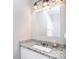 The bathroom features a granite countertop and modern vanity lighting at 2825 Old Pageland Marshville Rd, Wingate, NC 28174