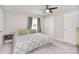 Comfortable bedroom boasts natural light, ceiling fan, and spacious closet at 2825 Old Pageland Marshville Rd, Wingate, NC 28174