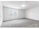 Bedroom with neutral carpet and natural light at 36131 Greg Norman Dr # 1031, Lancaster, SC 29720