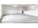 Large bonus room with neutral carpet and plenty of natural light at 36131 Greg Norman Dr # 1031, Lancaster, SC 29720