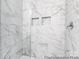Modern shower featuring marble-like tile and built-in storage niches at 36131 Greg Norman Dr # 1031, Lancaster, SC 29720