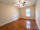 A bedroom featuring hardwood floors and a window at 380 Sweetgum Dr, Fort Mill, SC 29715