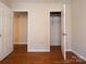 A room with hardwood flooring and access to a closet at 380 Sweetgum Dr, Fort Mill, SC 29715