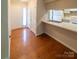 Bright dining area with hardwood floors, offering versatile space for dining and entertaining at 380 Sweetgum Dr, Fort Mill, SC 29715