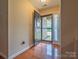 Welcoming entryway features hardwood floors and a decorative wreath on the front door at 380 Sweetgum Dr, Fort Mill, SC 29715